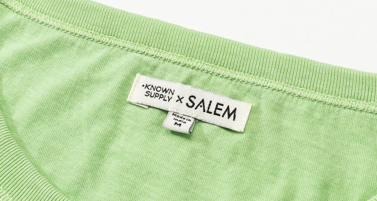 Known Supply × Salem co-branded neck label